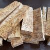 A collection of 16 curly birch scales, featuring a spectacular display of natural swirling grain patterns.