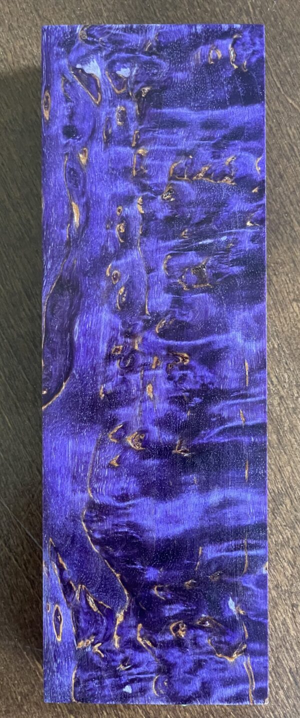 Purple dyed and stabilized Masur birch, knowna also as Curly bircb, plank. This species pattern is one of kind containing curly- birdseye- and vawy pattern. Ideal for makind wooden pens, sustainable wooden jewelry or DIY knife handle.